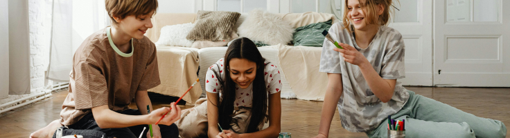 Teens painting together