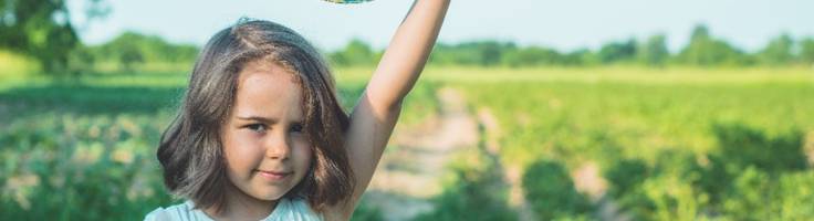 Child in a field