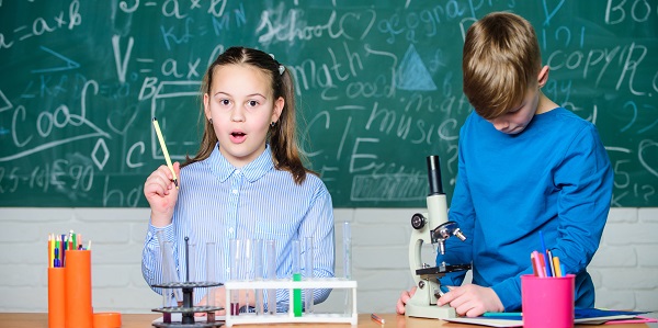 Children studying together during a science lesson