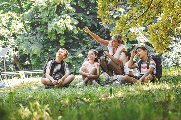 Teacher and children observing a natural setting