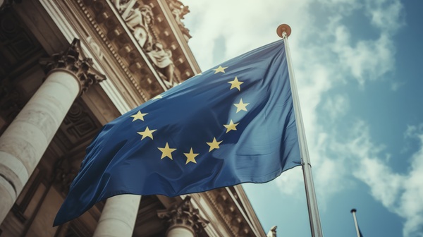 EU flag flying in front of a building