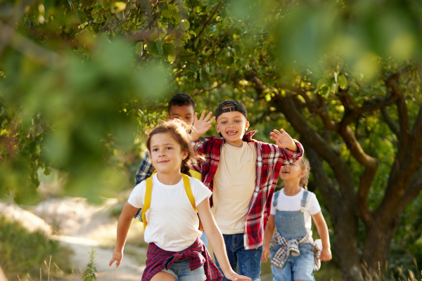 kids running in the forest