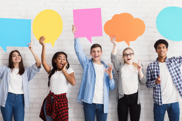 people holding speech bubbles