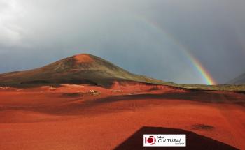 Picture of a volcano under the rain bow