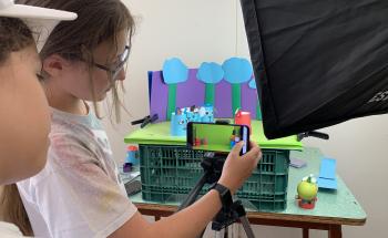 Children recording an animation film with their mobile