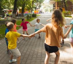 Children dancing in a circle