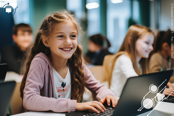 Girl typing on her laptop