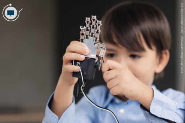 Kid playing with robot hand